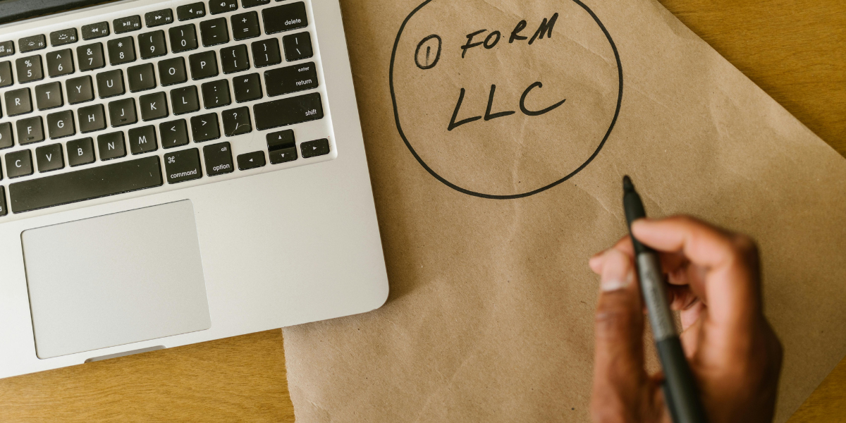 BETWEEN AN LLC, CORPORATION, OR PARTNERSHIP?