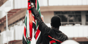 raising flag in protests in Kenya 1