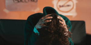 1 domestic violence in Kenya woman bowed down